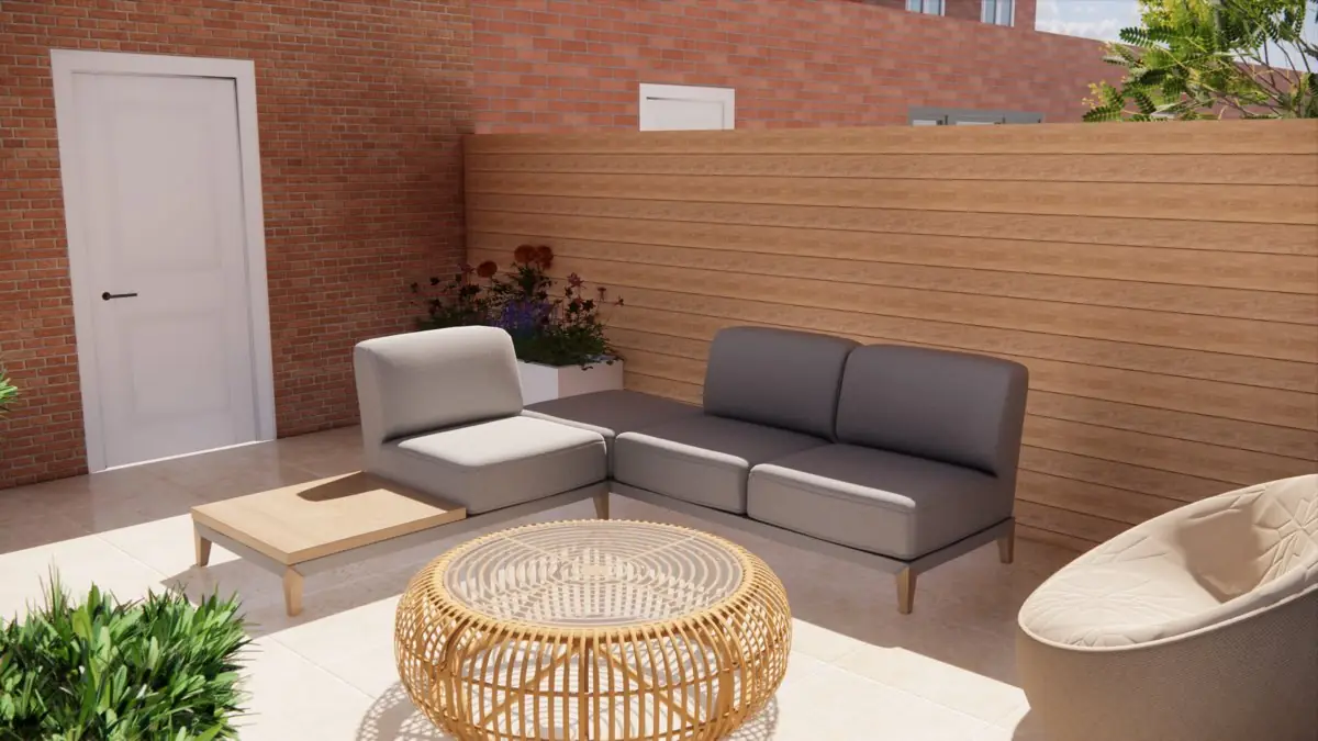 3D-ontwerp van de zithoek in de Haagse stadstuin: een hoekbank met een rieten salontafel op een licht terras, tegen een bakstenen muur met een witte deur en een houten schutting